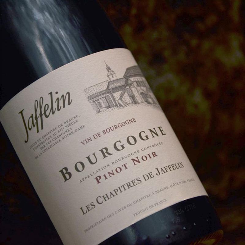 Close-up of a Maison Jaffelin Bourgogne Pinot Noir wine bottle label featuring vineyard estate artwork and Burgundy appellation details.